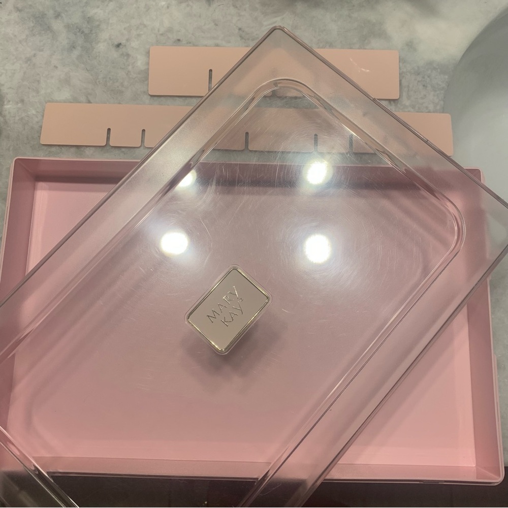Vintage Mary Kay Cosmetic Shade Organizer in pink.